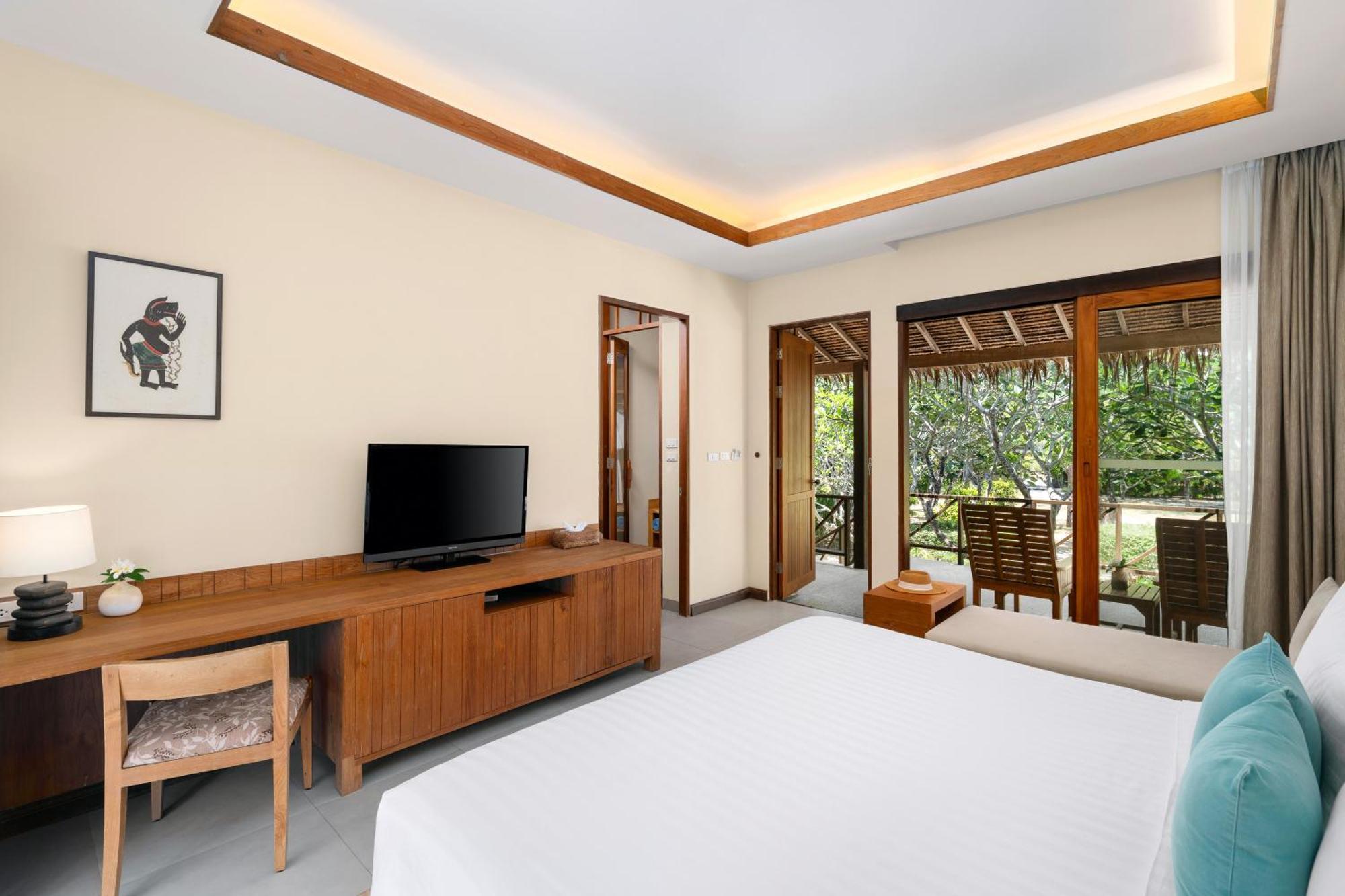 Bungalow 1 Lit King-Size Deluxe - Côté Jardin