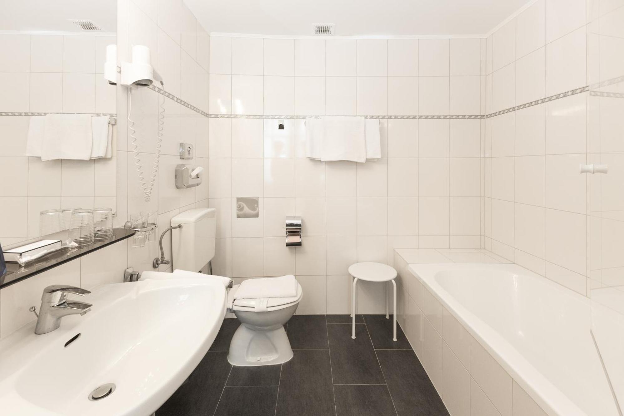 Double Room with Couch (2 Adults + 1 Child)