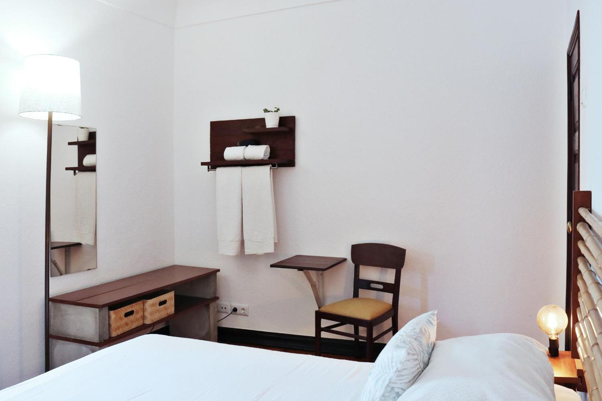 Quarto Duplo com Casa de Banho Partilhada