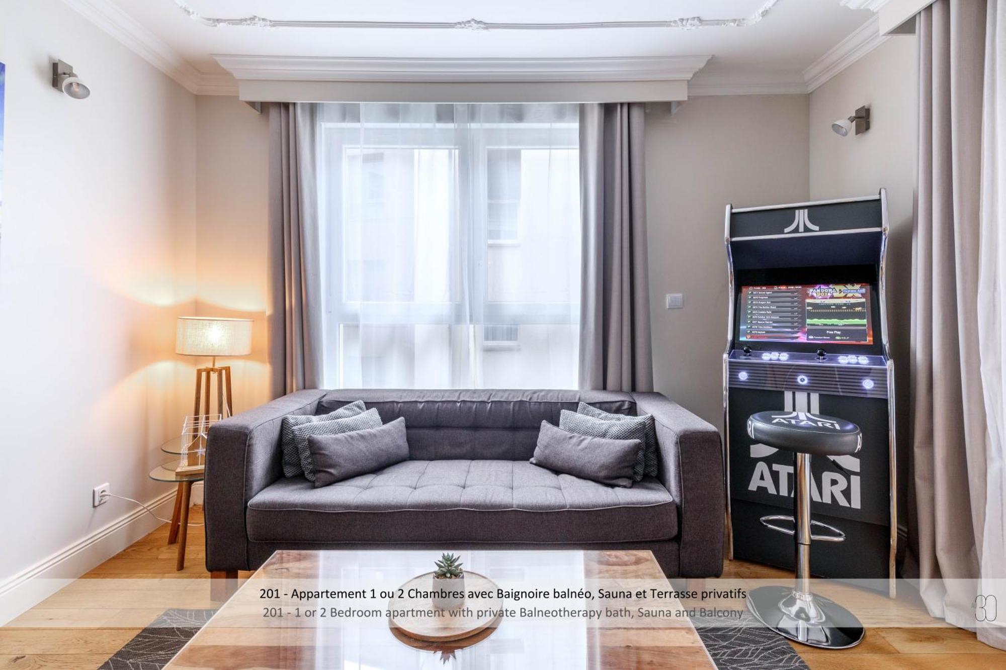 Appartement 1/2 Chambres avec Baignoire Spa, Sauna et Terrasse