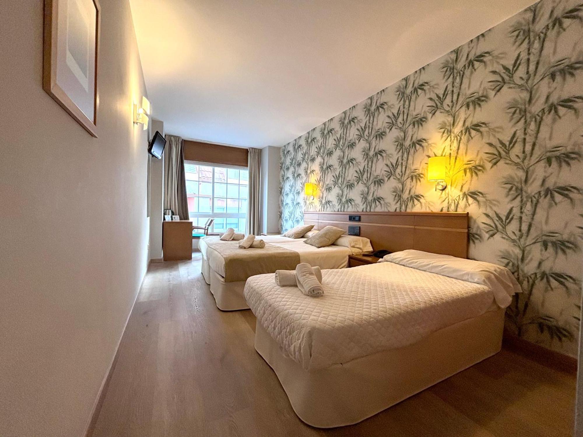 Habitación Triple con vistas a la ciudad