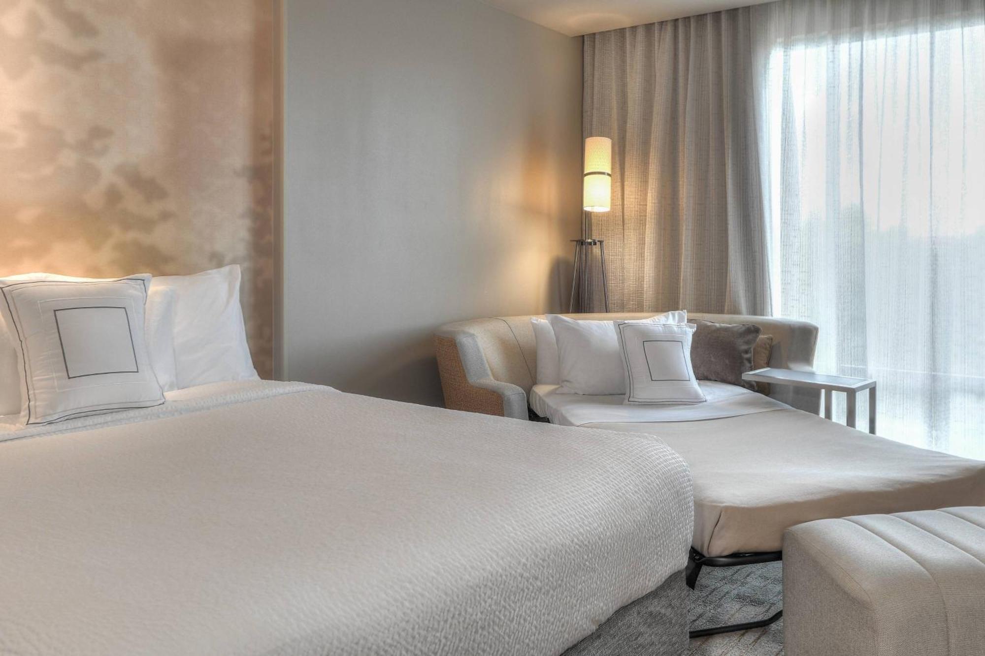 Queen Room with Two Queen Beds and Sofa Bed