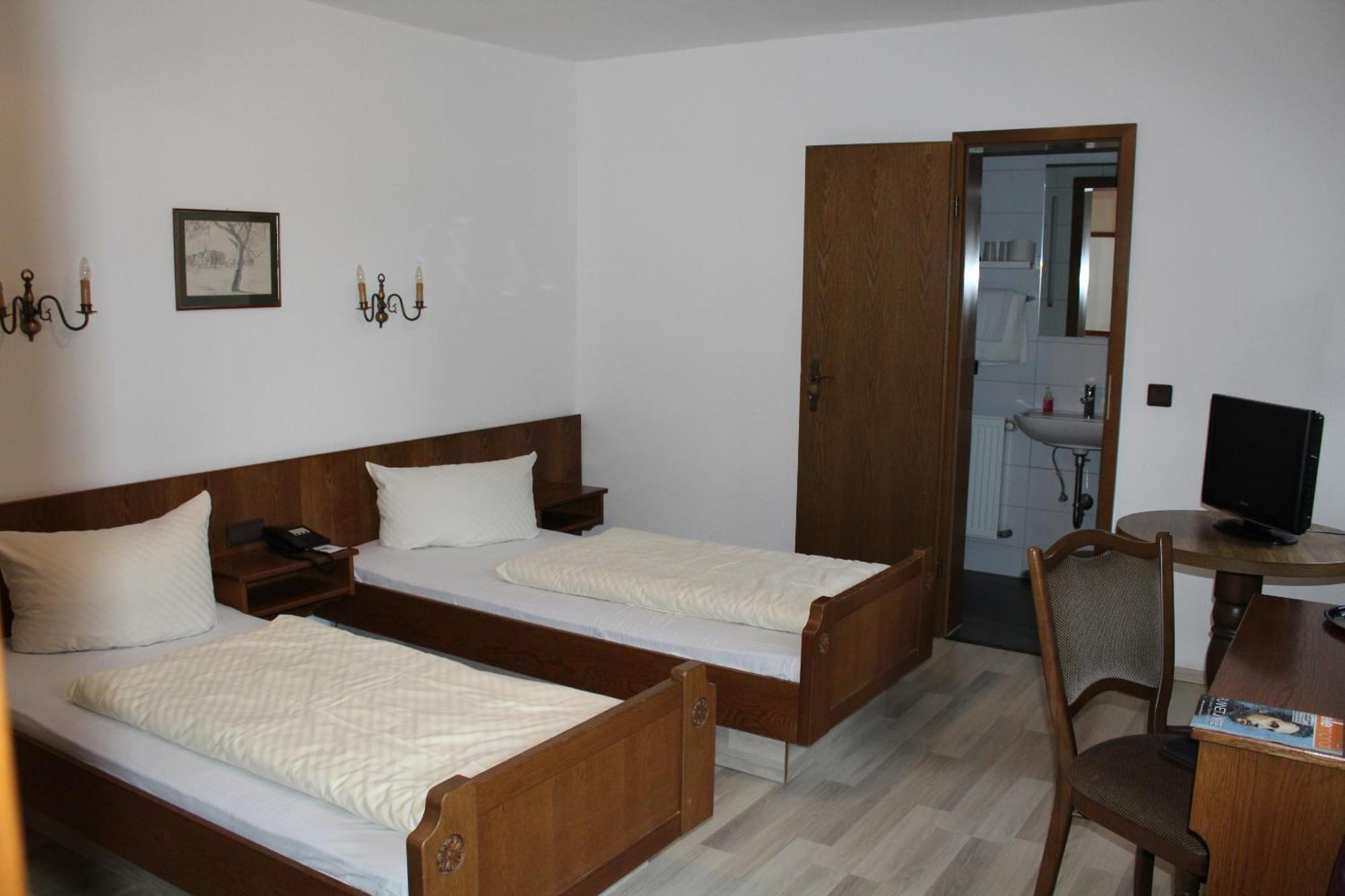 Standard Zweibettzimmer mit Gartenblick