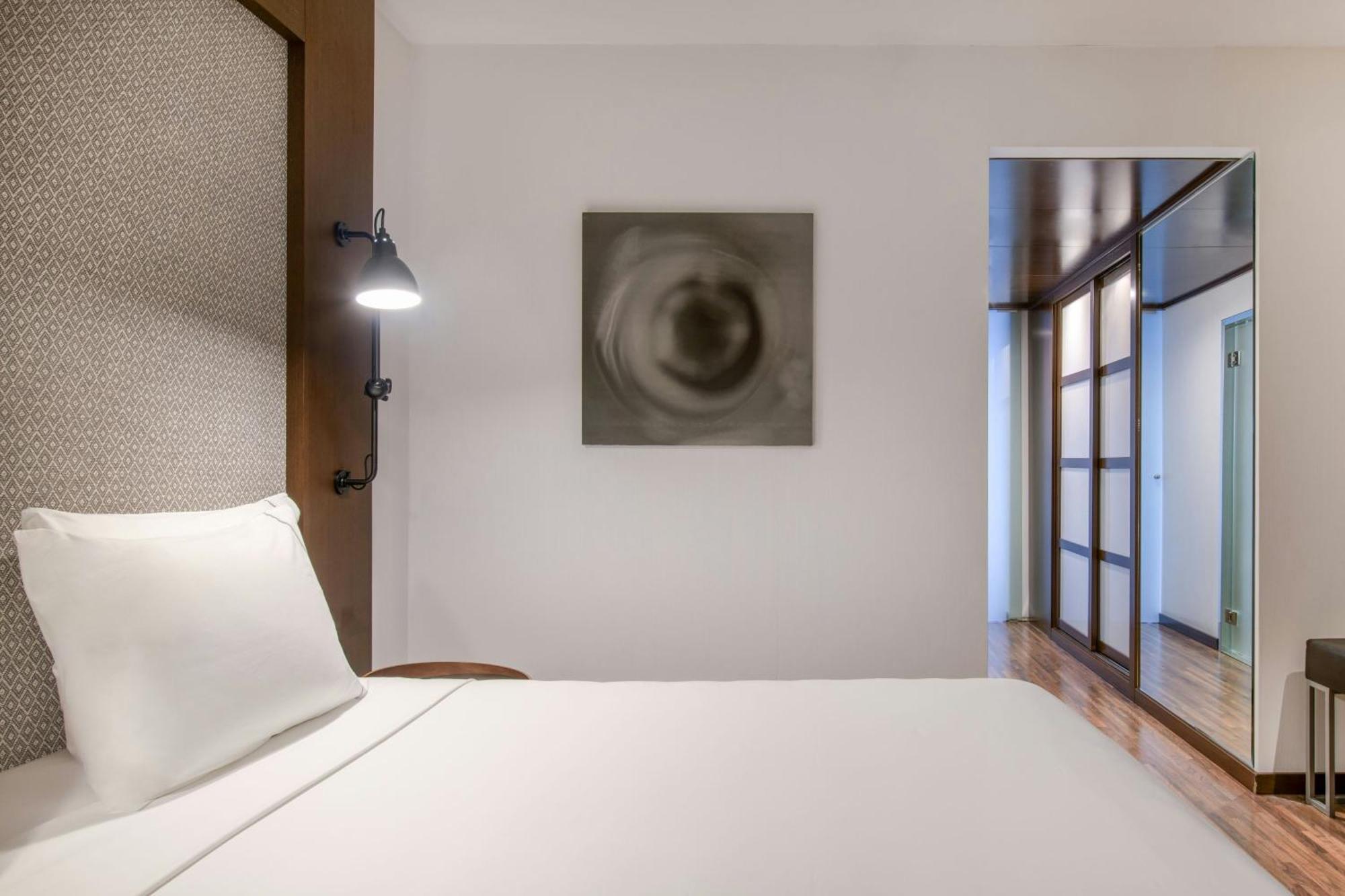 Junior Familiesuite met 1 Kingsize Bed en Slaapbank