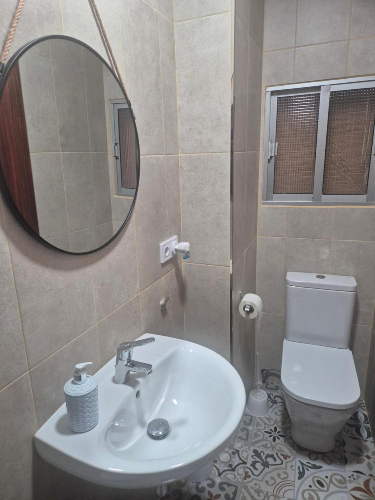 Tweepersoonskamer met 1 of 2 Bedden en Gedeelde Badkamer