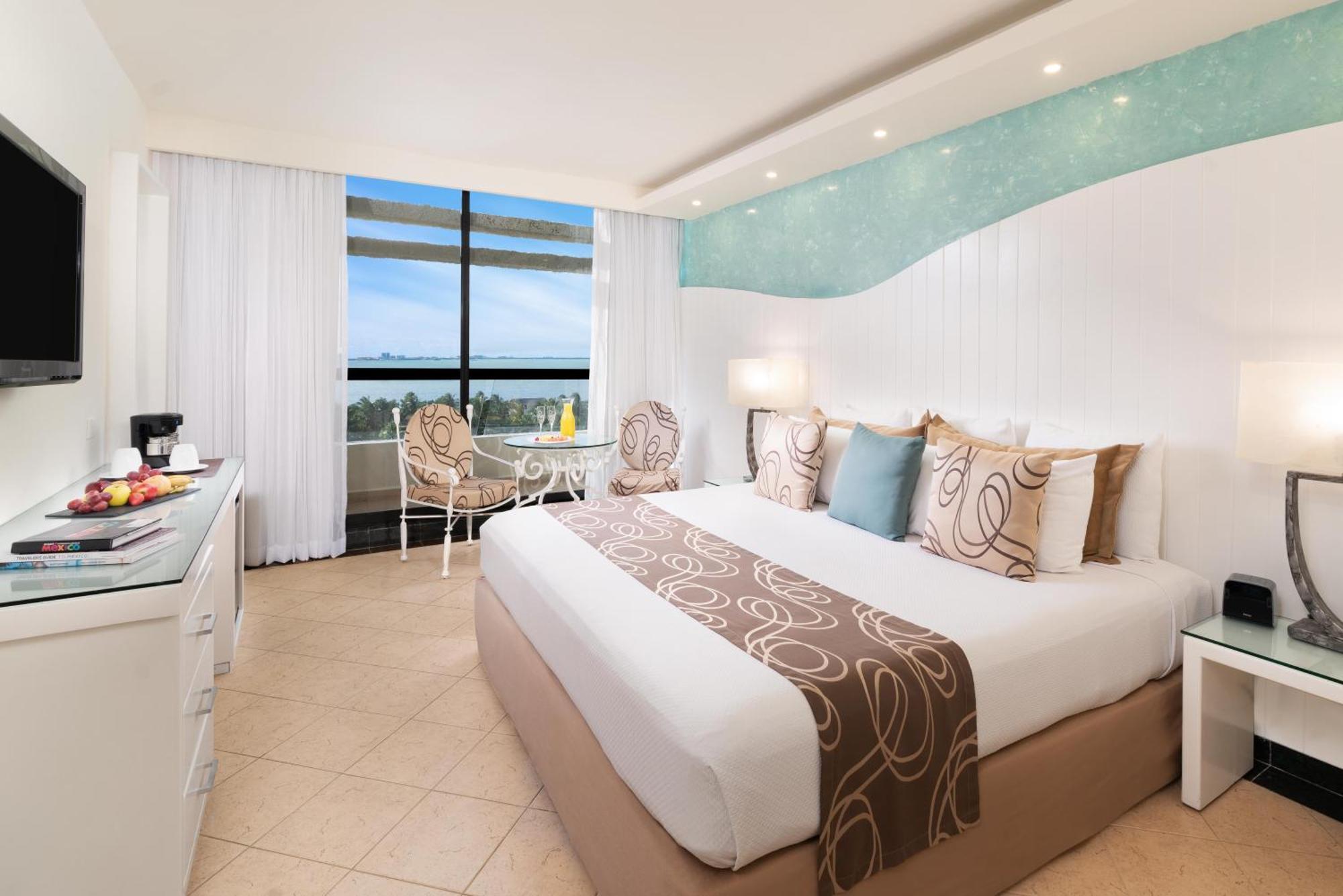 Quarto Grand com Vista do Pôr do Sol