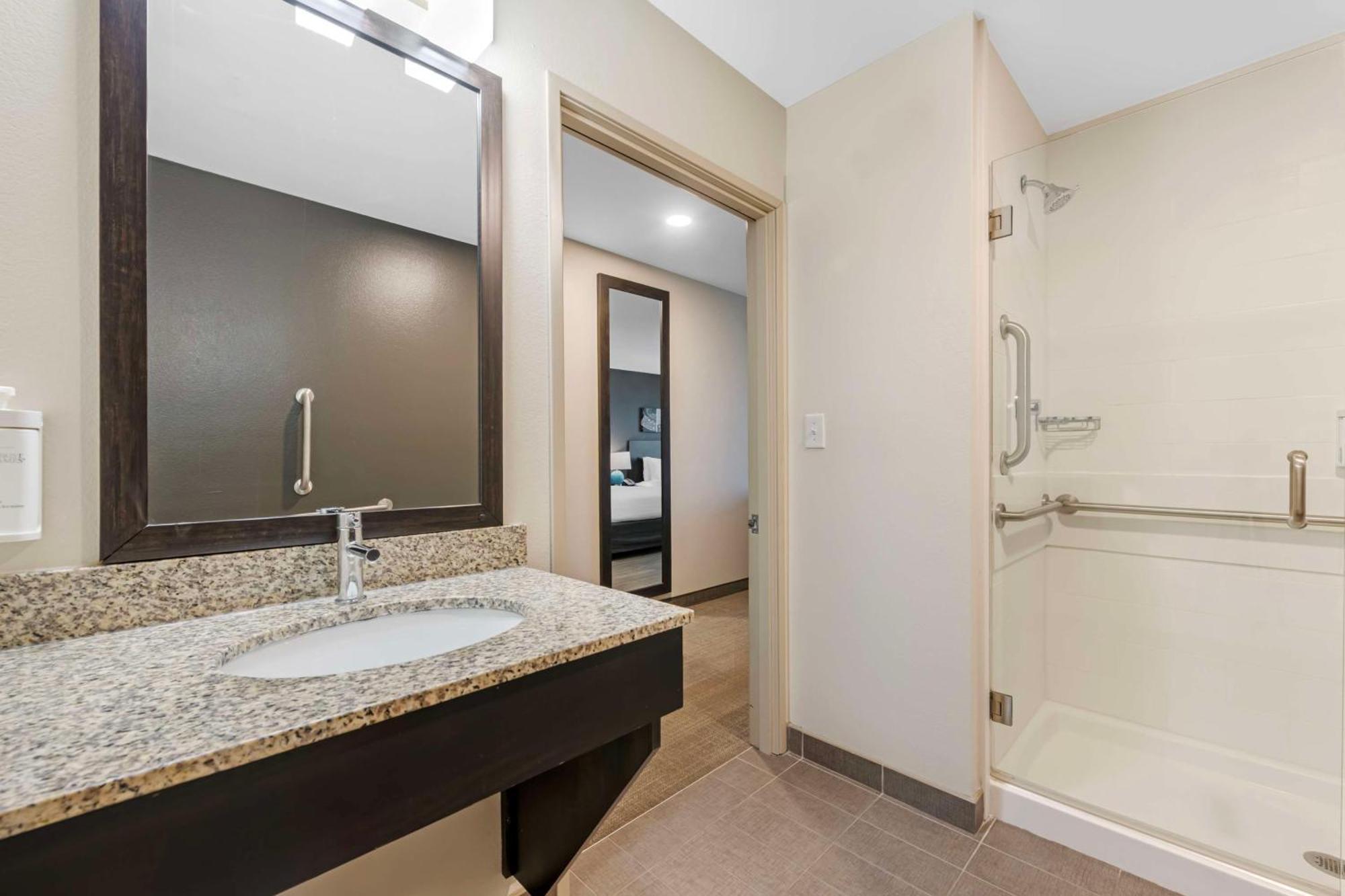Queen Room with Two Queen Beds and Mobility Accessible Roll-In Shower