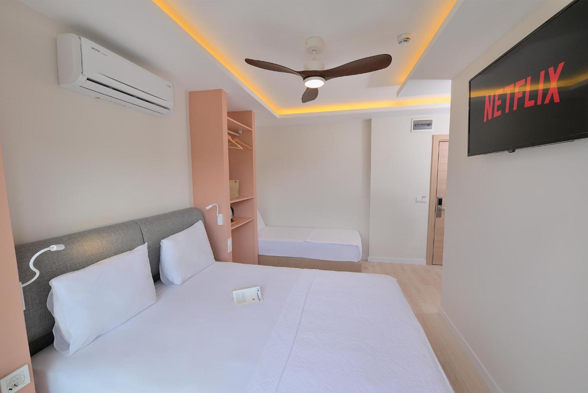 Dreibettzimmer mit Balkon