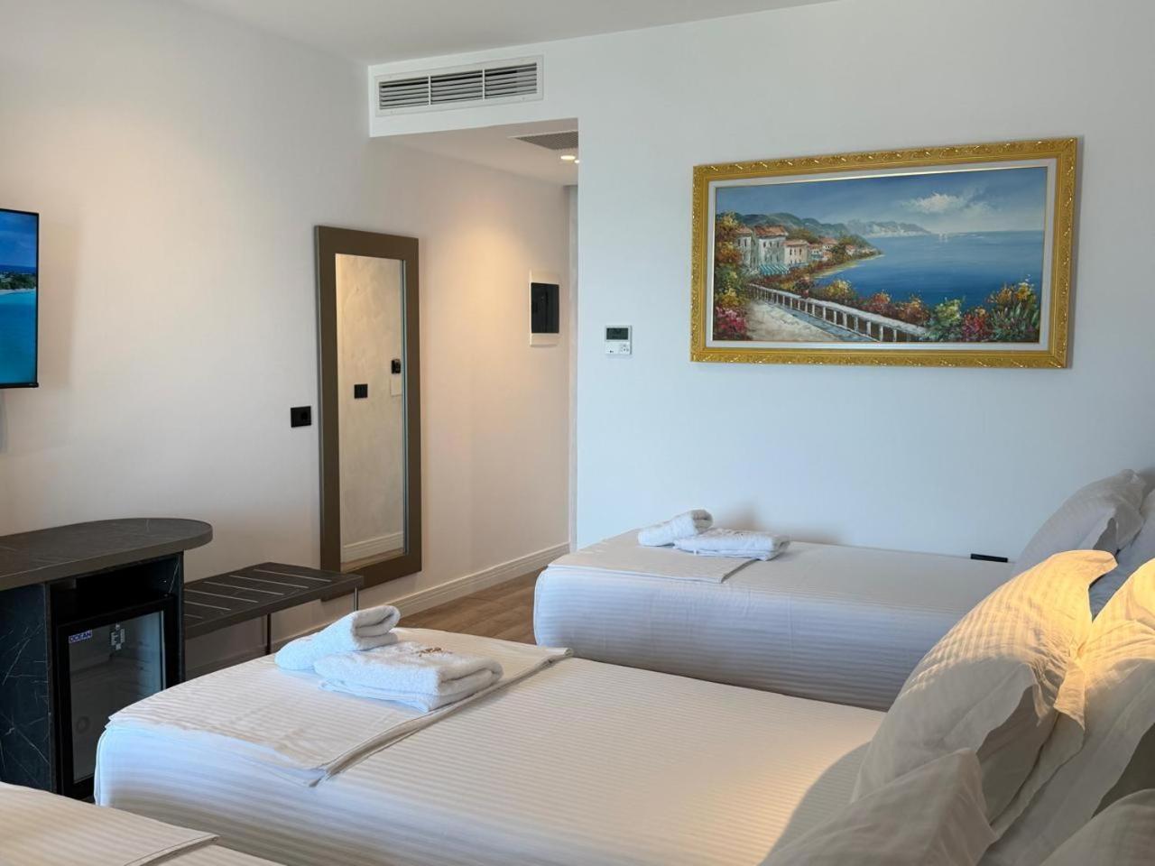 Dreibettzimmer mit Meerblick