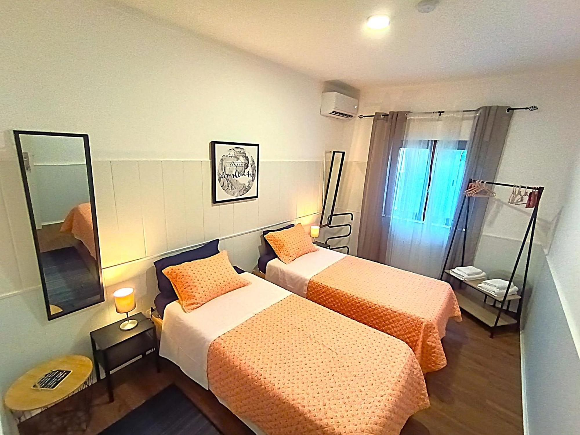 Quarto Duplo com Casa de Banho Partilhada