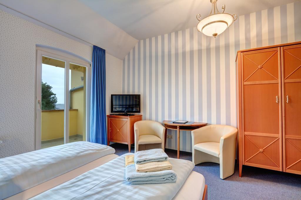 Doppelzimmer mit Meerblick und Balkon