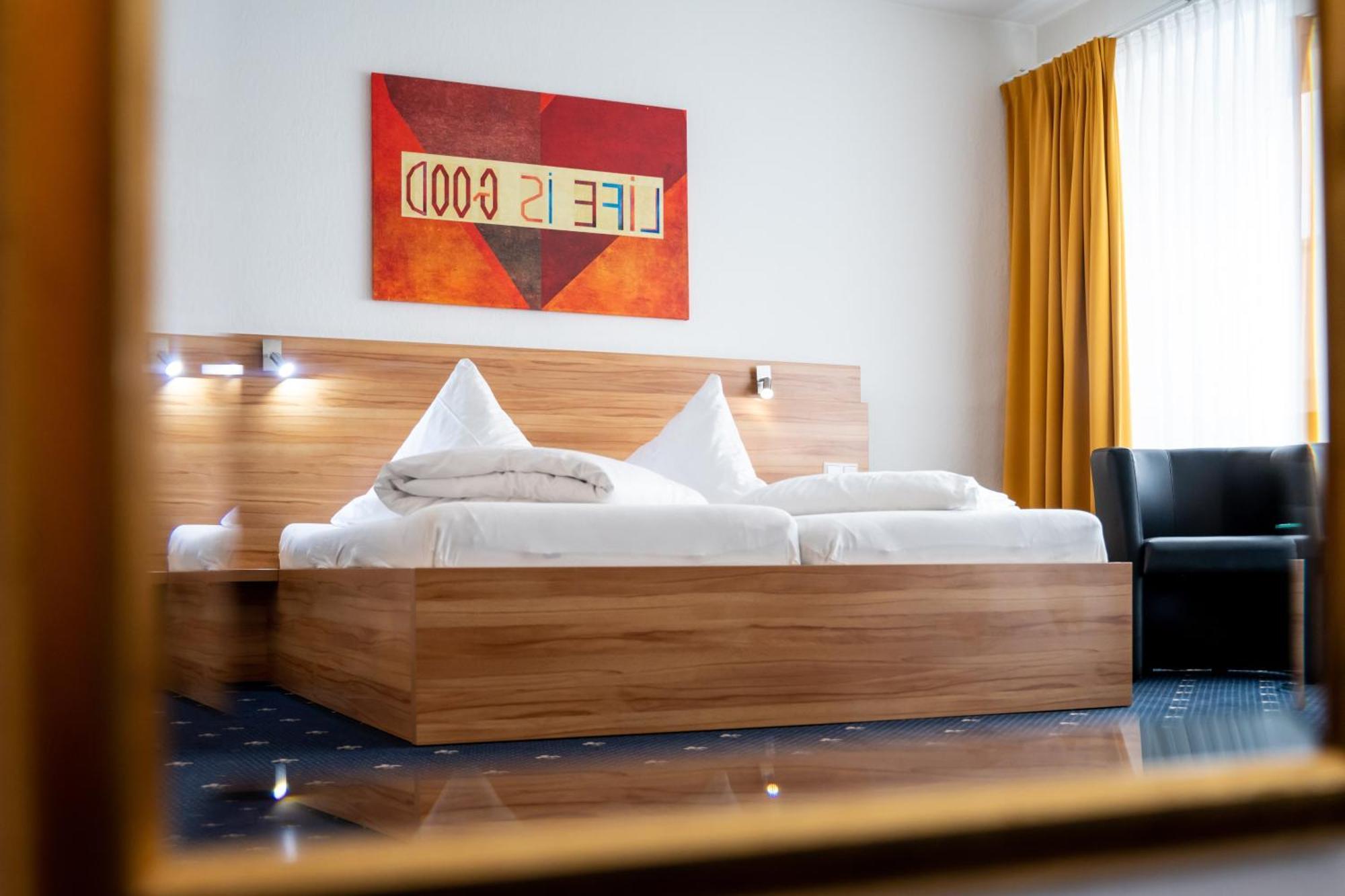 Doppelzimmer mit Balkon zum Innenhof