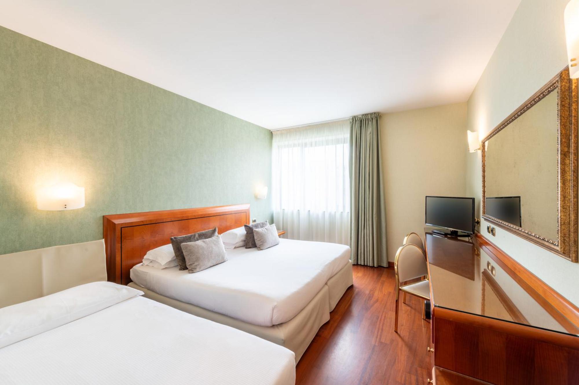 Camera Matrimoniale Superior con Letto Supplementare
