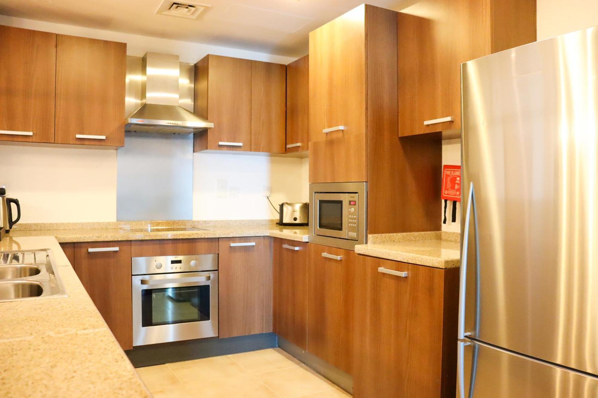 Deluxe Two Bedroom Apartment - Complimentary Transfer to Mall of the Emirates, Insurance Market Metro Station & Jumeirah Beach,1472093923:JPEG