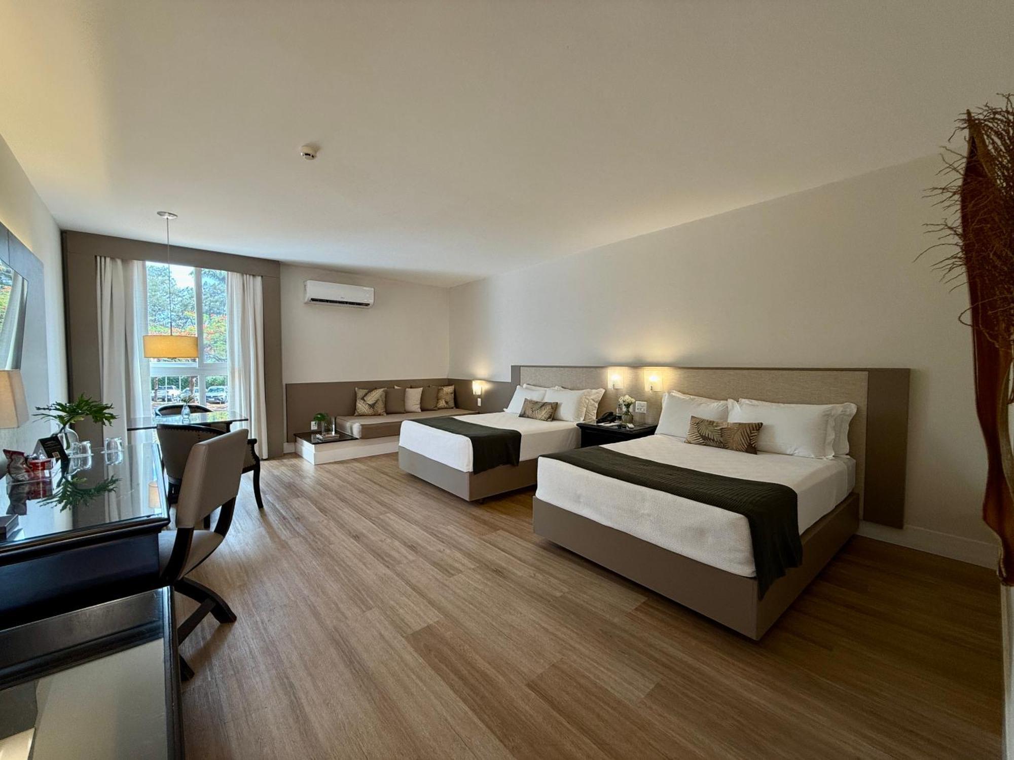 Deluxe room 2 double beds a garden view