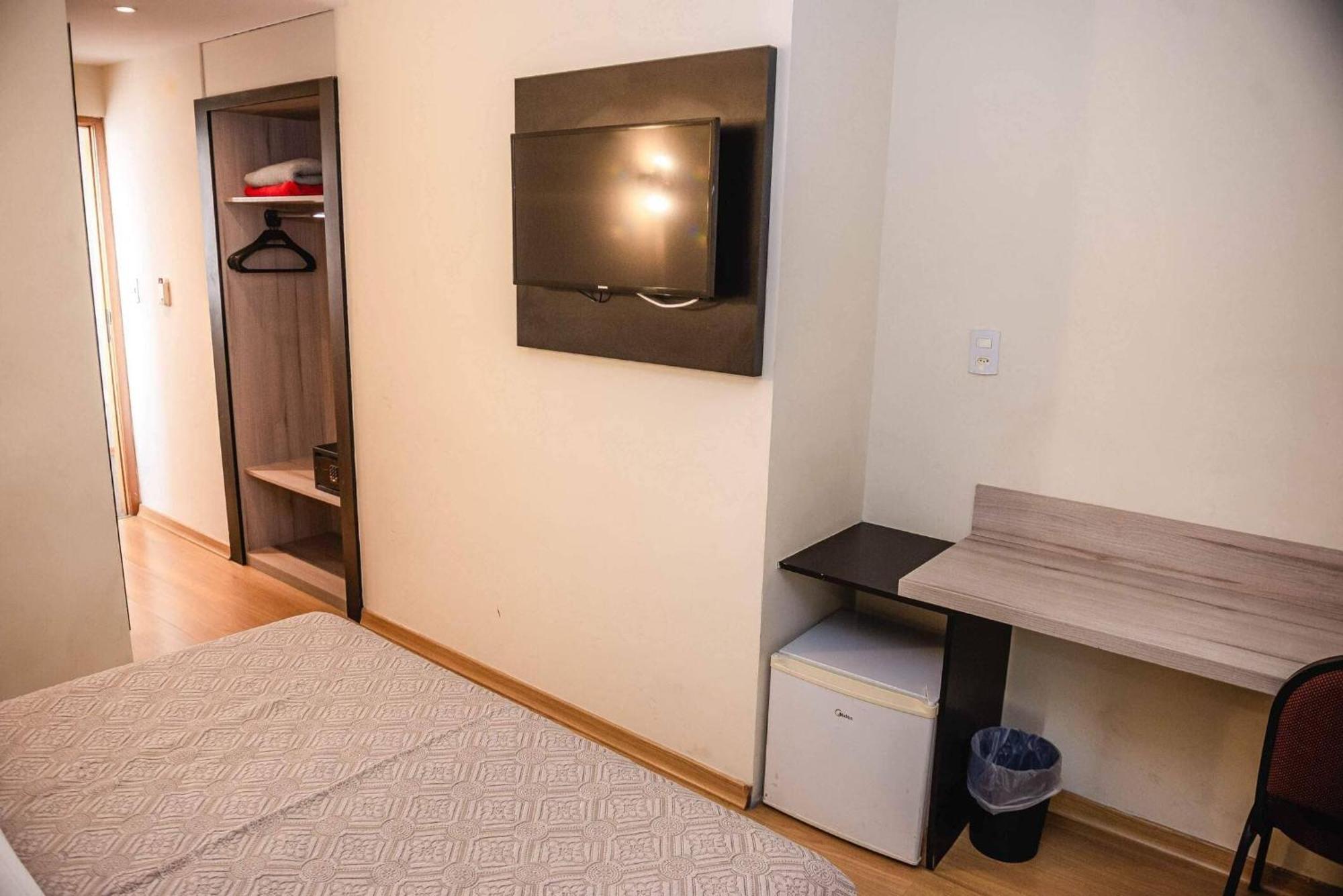Quarto Triplo Executivo