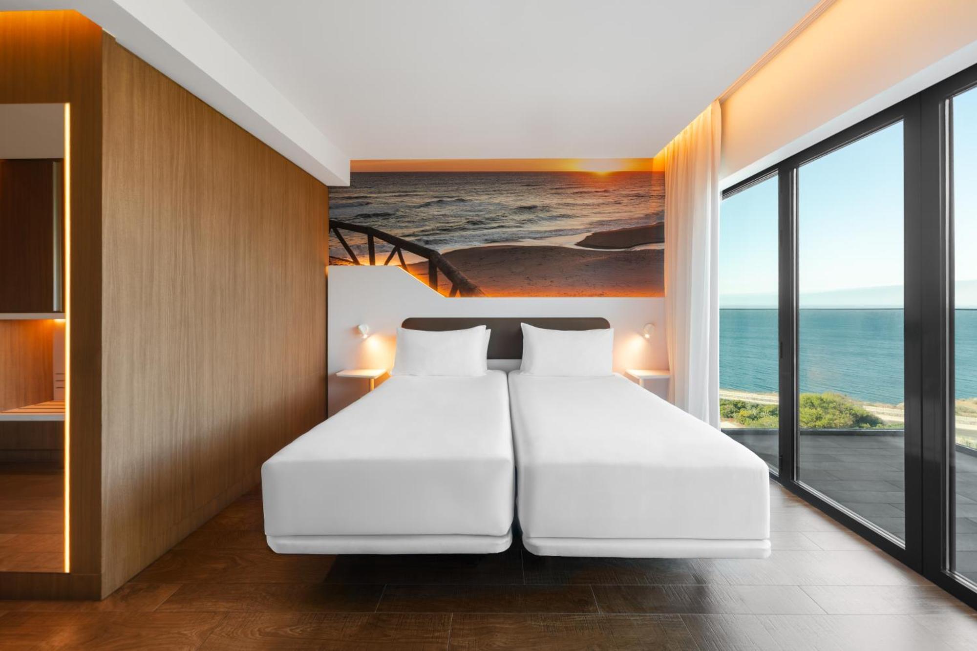 Zimmer mit Queensize-Bett oder 2 Einzelbetten, Balkon und Meerblick