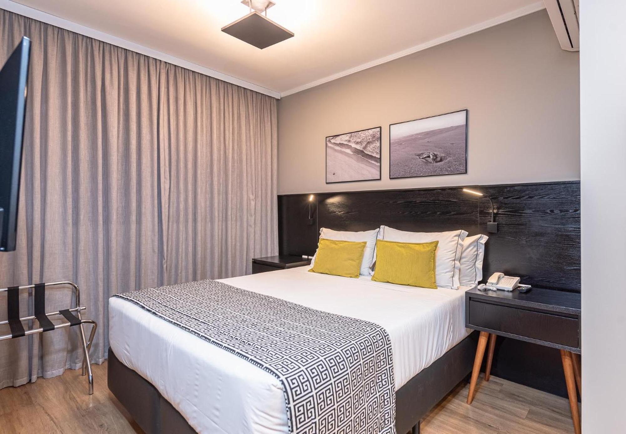 Quarto Executivo com Cama Queen-size