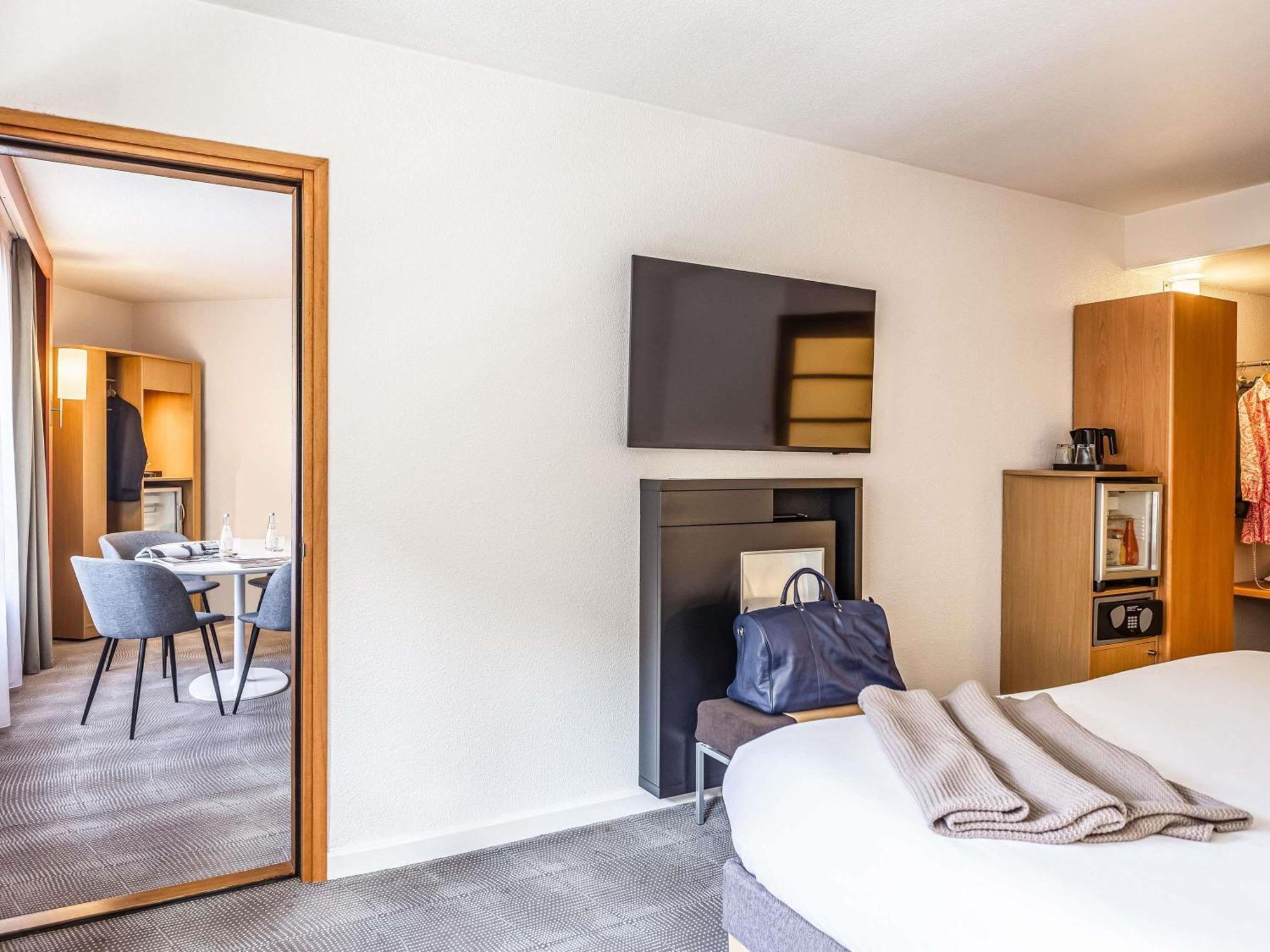 Suite con 1 cama doble y 1 sofá cama