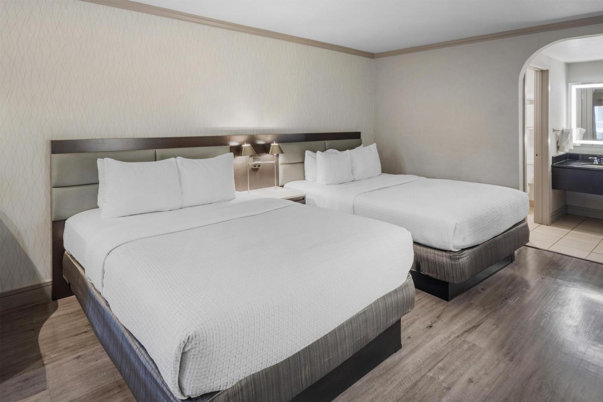 Queen Room with Two Queen Beds and Single Sofa Bed