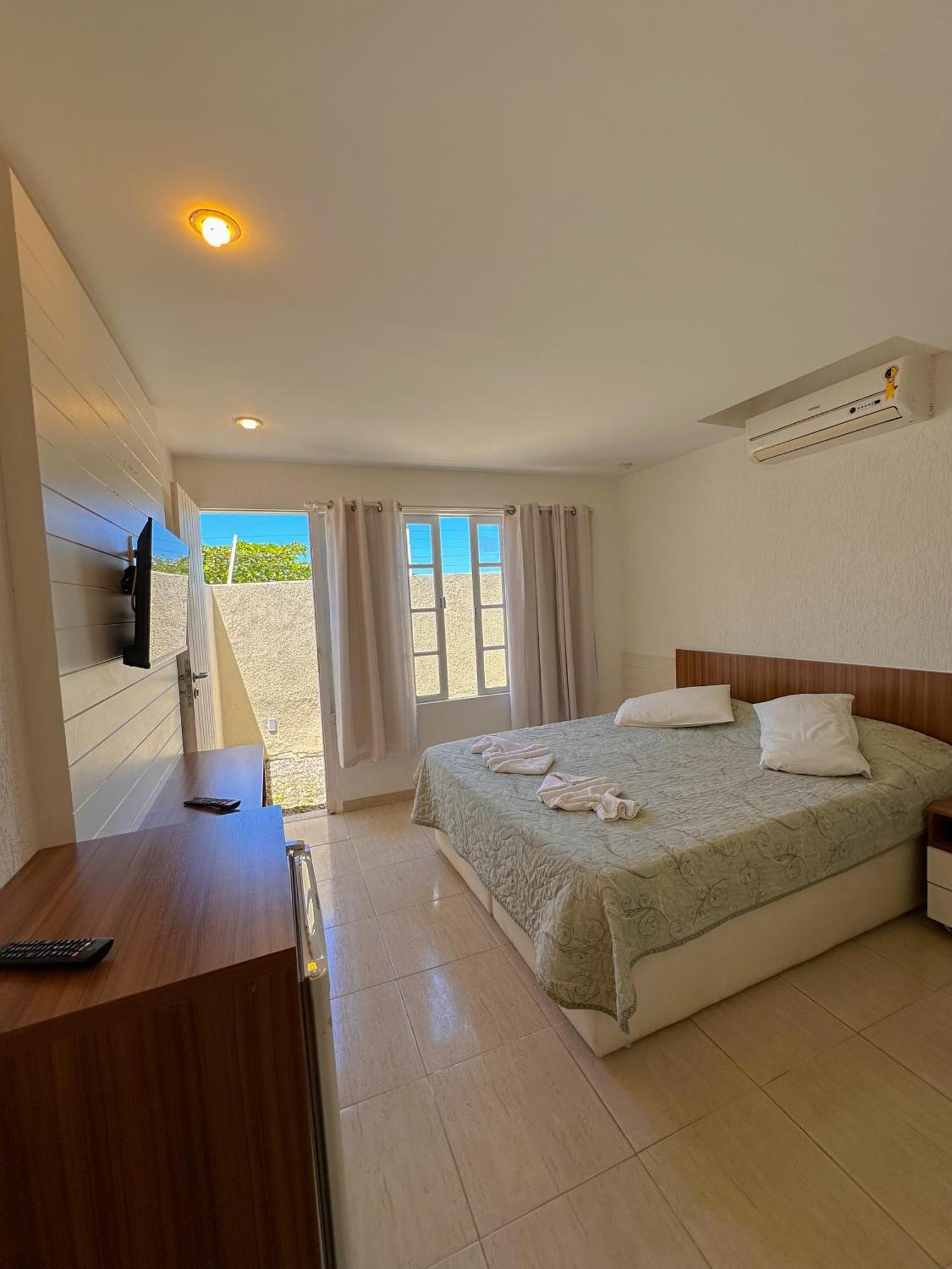 Quarto Quádruplo Premium