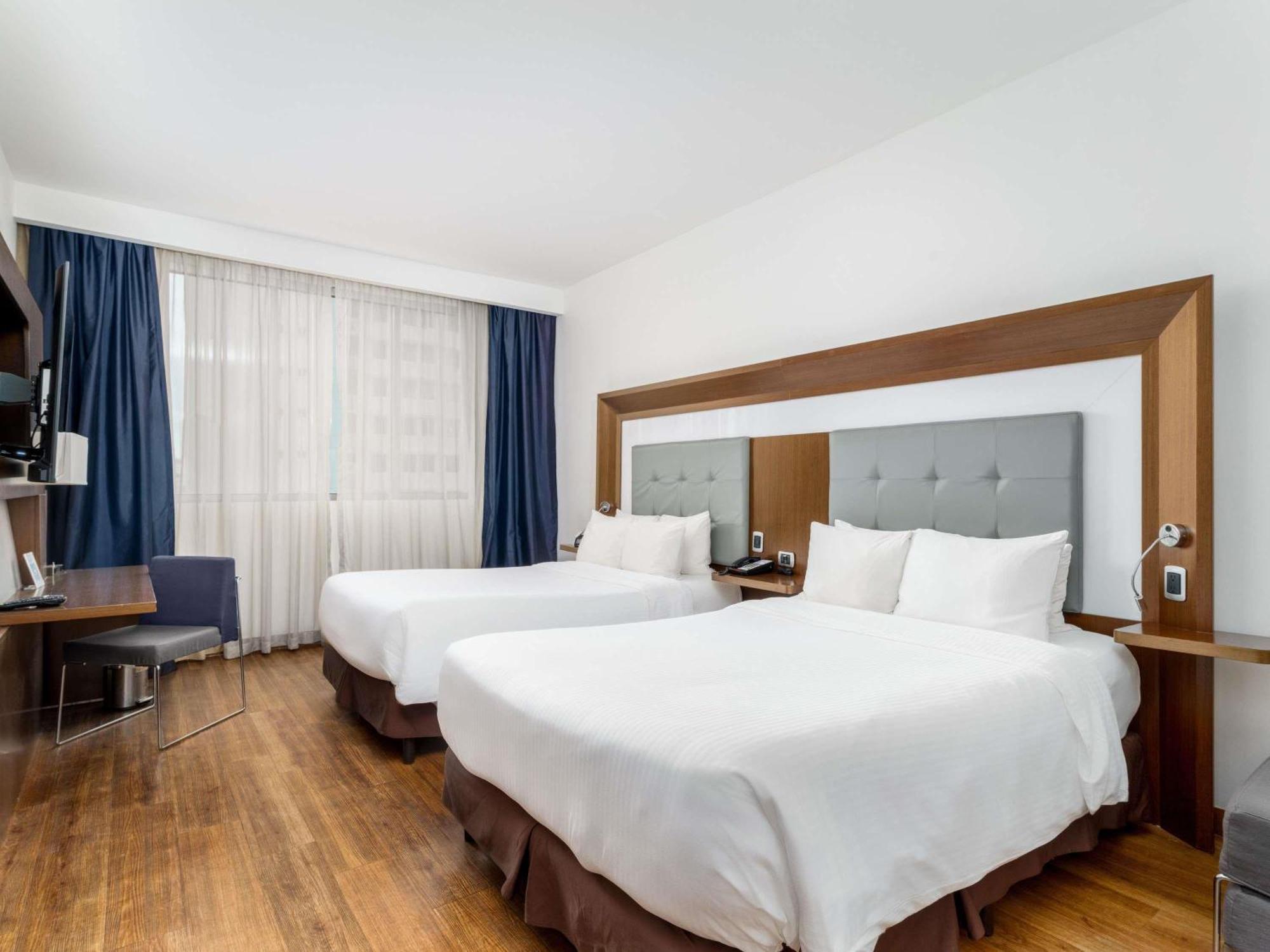 Executive Room with Two Double Beds and Sofa Bed,1722957868:JPEG