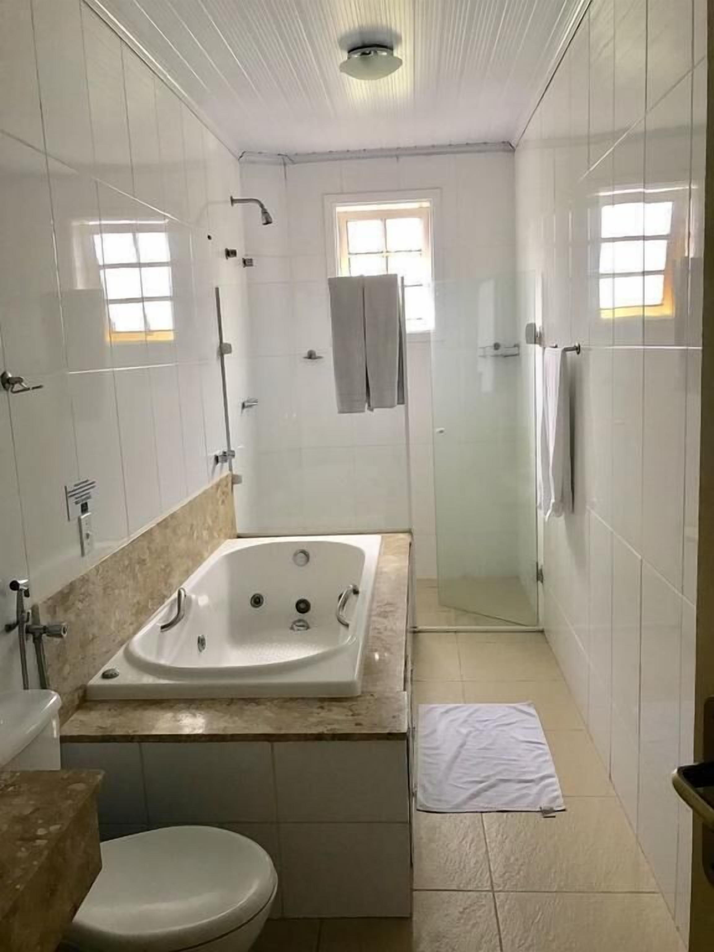 Quarto Quádruplo com Banheira