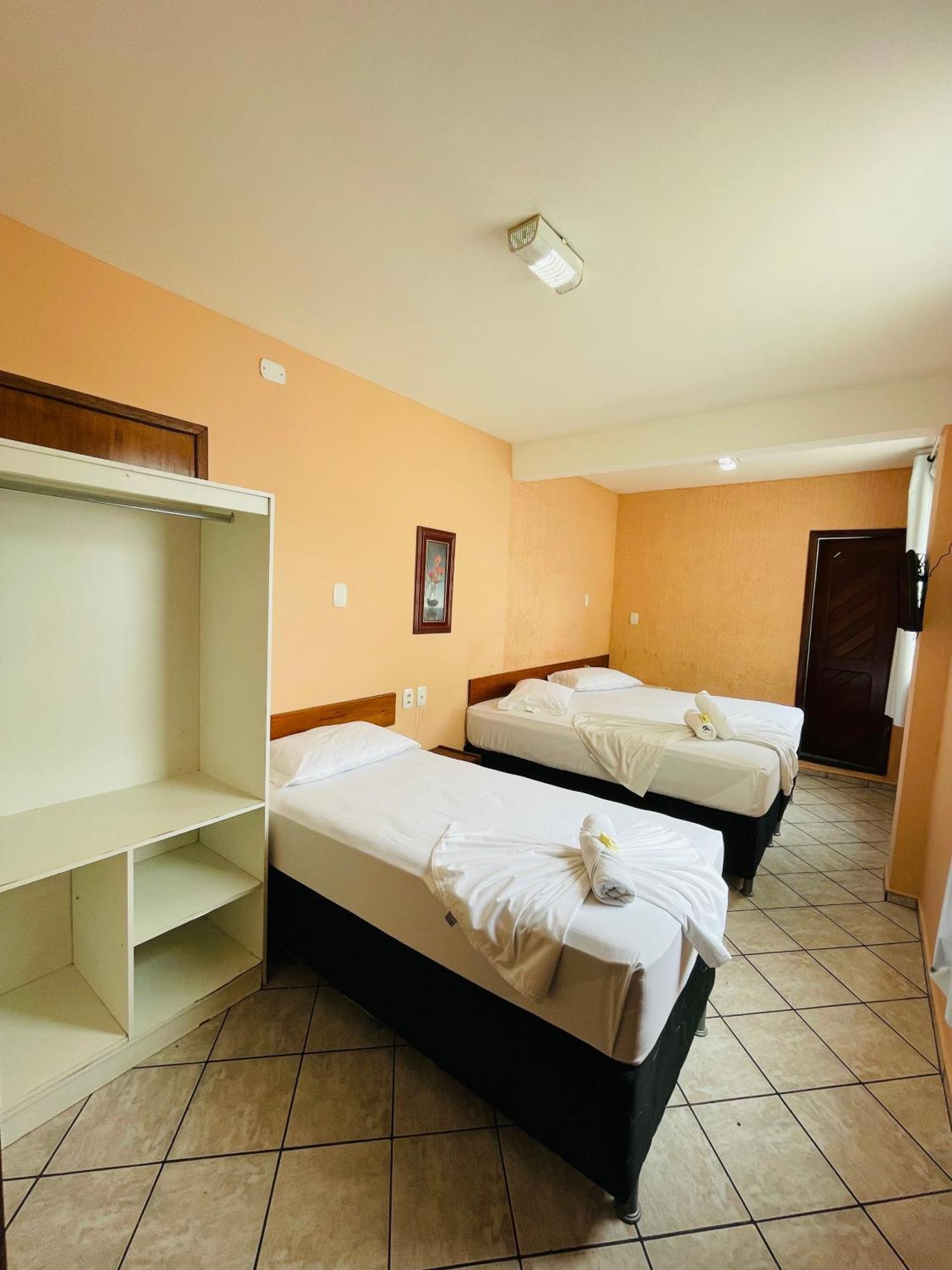 Quarto Superior Triplo com Ar-condicionado