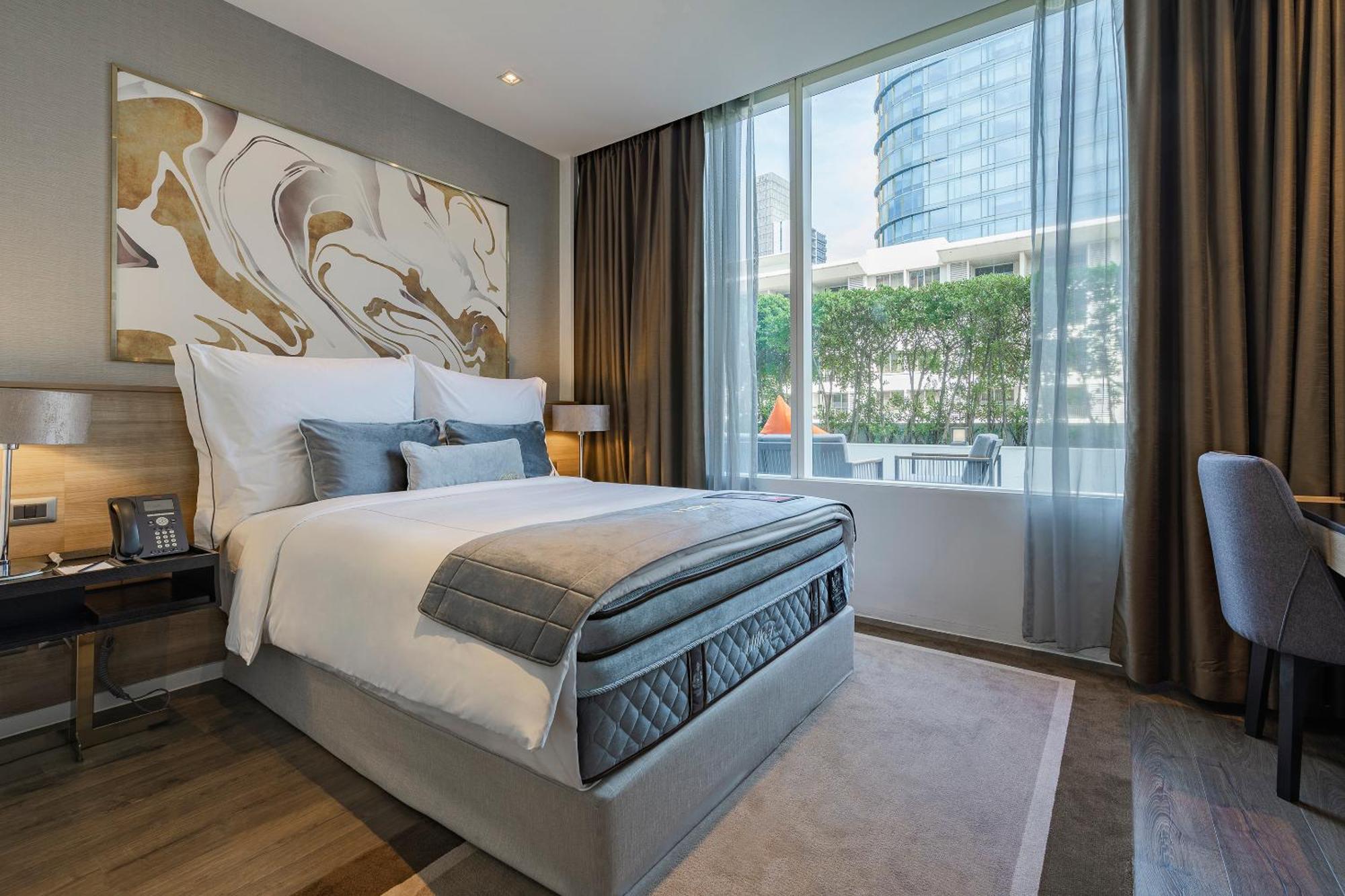 Suite mit 2 Schlafzimmern und Terrasse mit Gartenblick