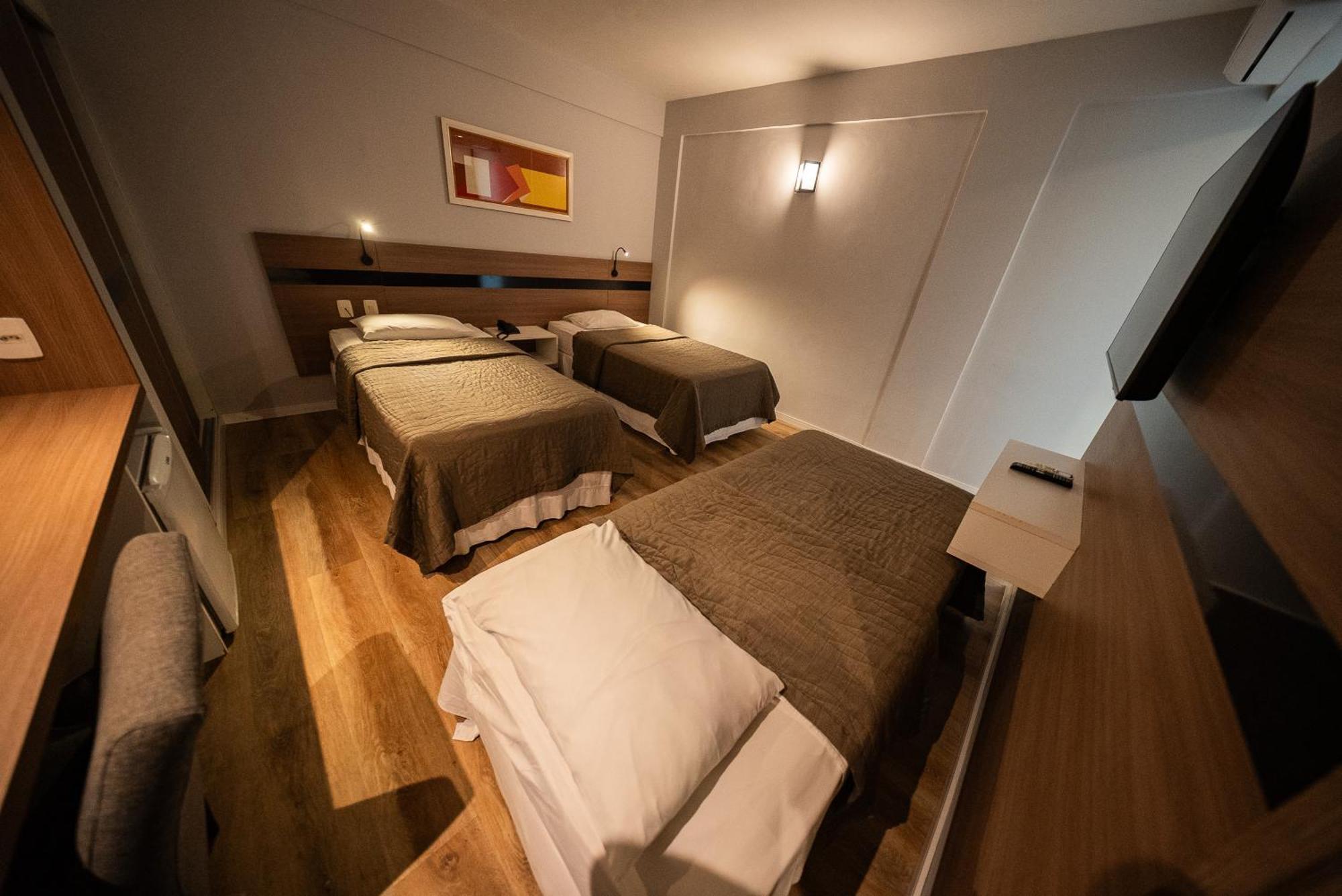 Quarto Triplo Luxo