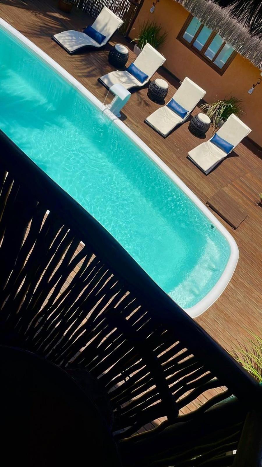 Suíte com Vista para a Piscina