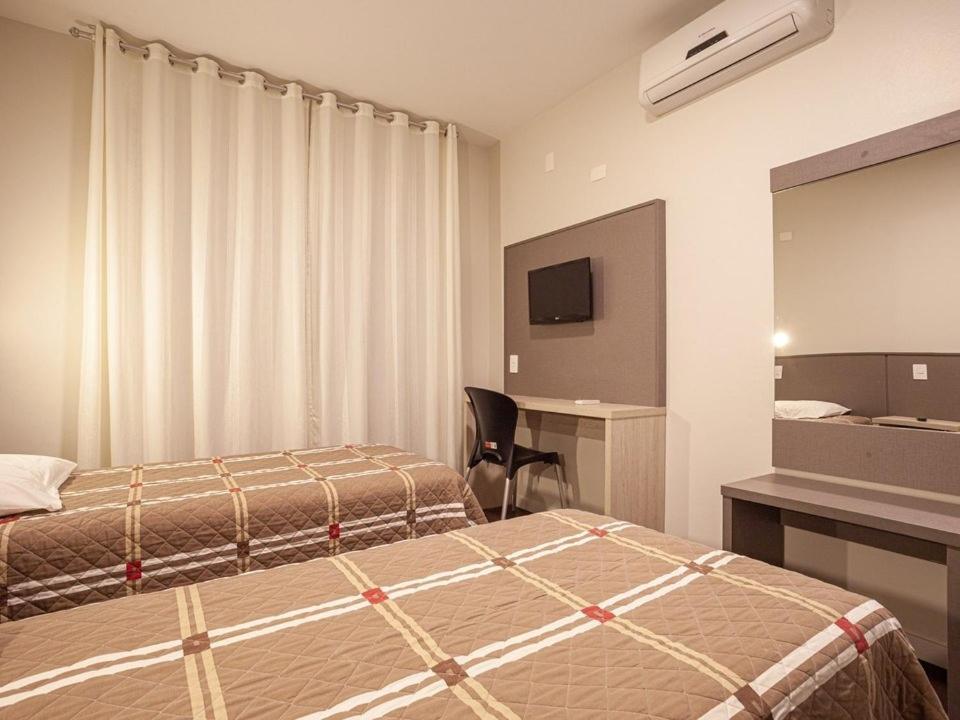 Quarto Triplo Luxo