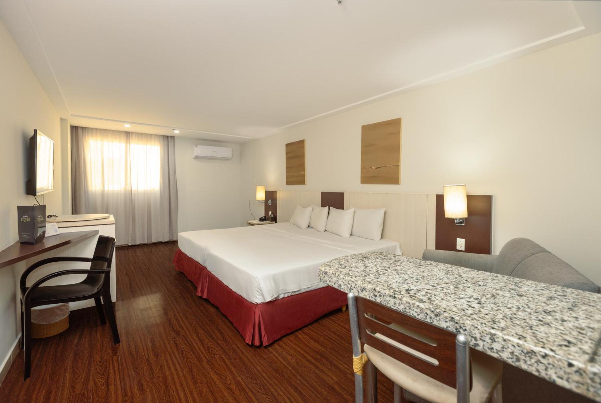 Quarto Executivo com Cama Queen-size