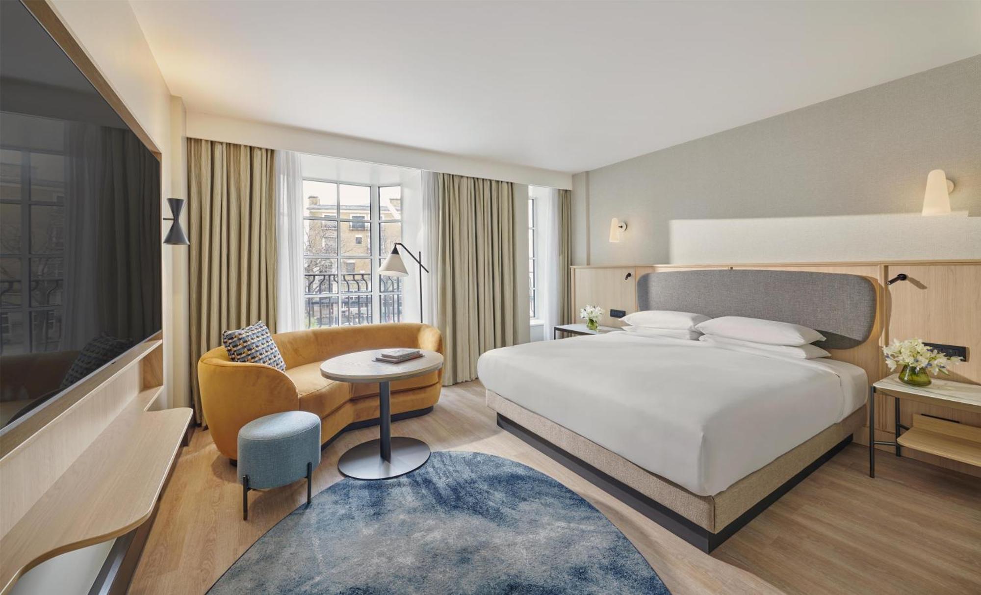 Zimmer mit Kingsize-Bett und Stadtblick - Zugang zum Club