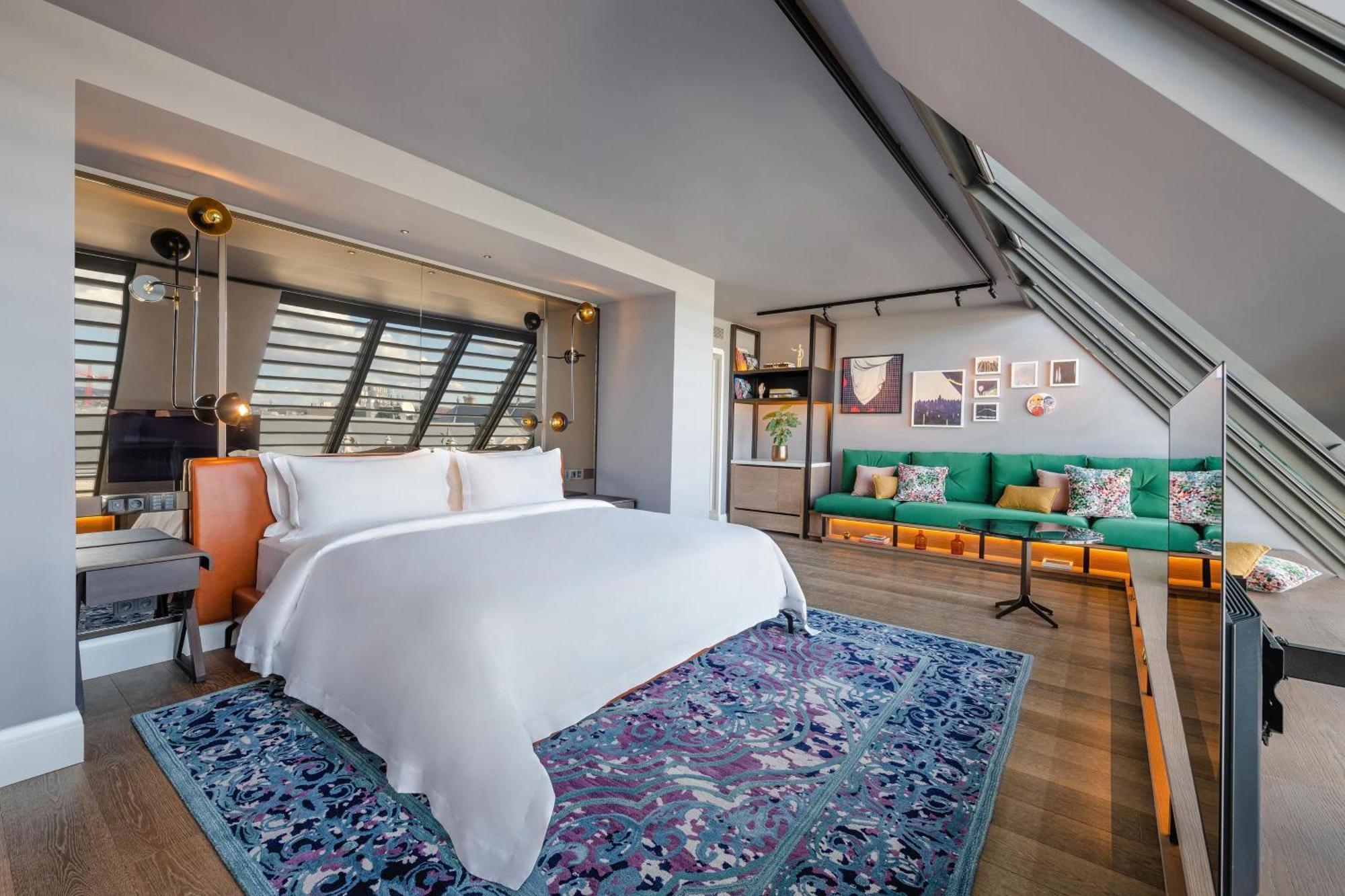 Loft Zimmer mit Kingsize-Bett und Stadtblick - oberste Etage