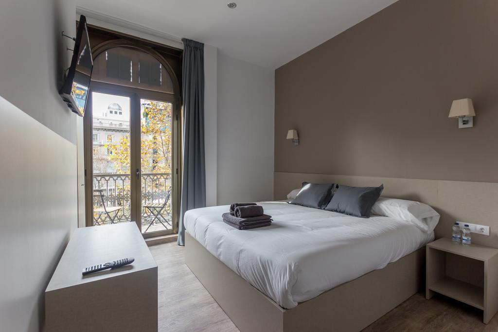 Quarto Duplo com Varanda e Vista da Cidade