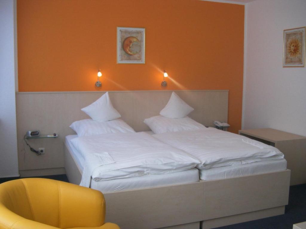 Doppel- oder Zweibettzimmer