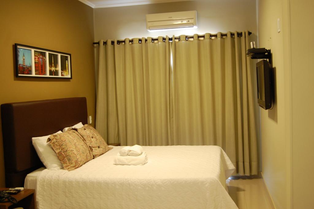 Quarto Triplo com Varanda