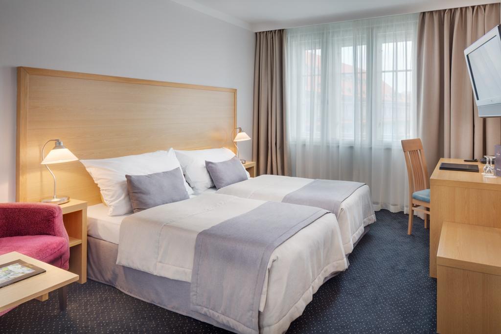 Standaard Tweepersoonskamer met 1 of 2 Bedden en een Extra Bed