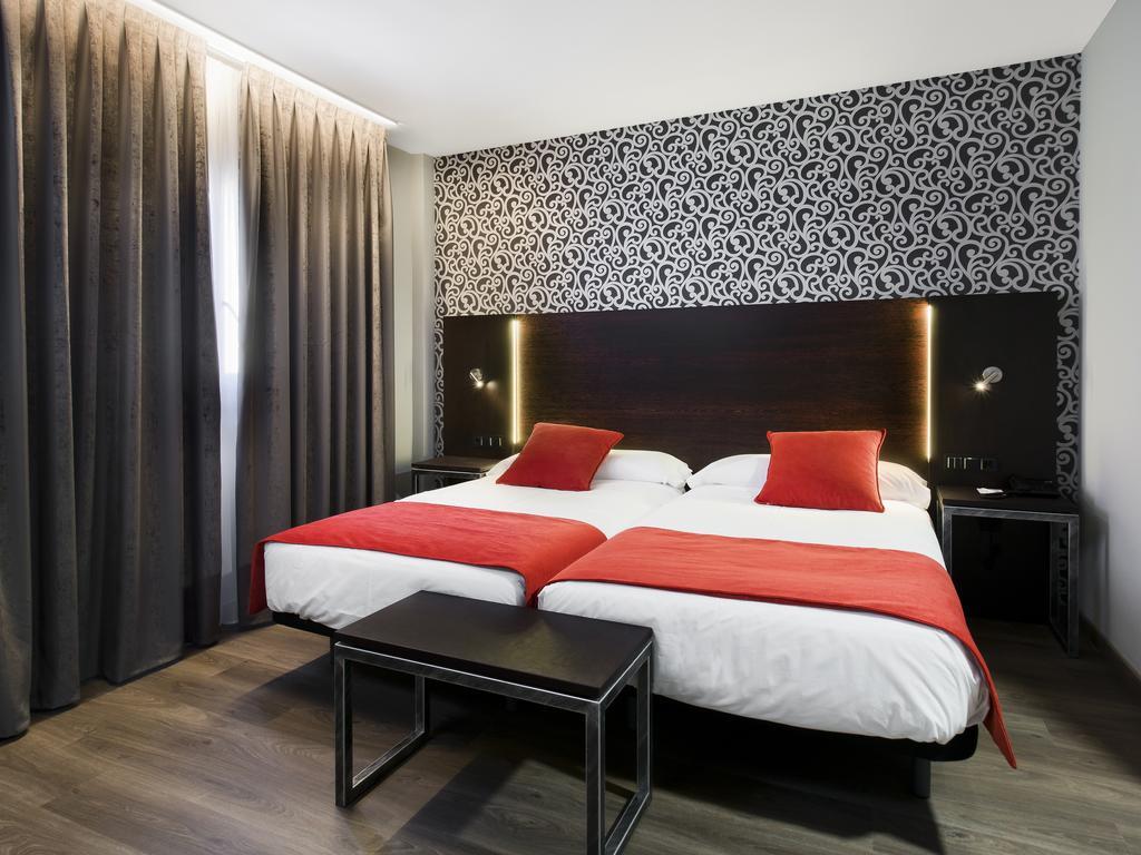 Habitación Doble con cama supletoria (2 adultos + 1 niño) - 2 camas