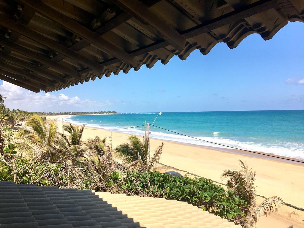 Suíte Panorâmica com Banheira de Hidromassagem e Vista do Mar