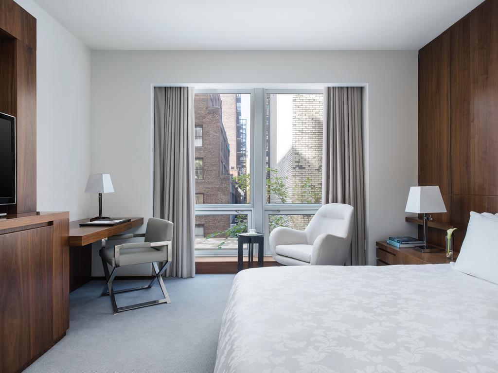 Quarto Superior com Cama King-size e Vista Cidade