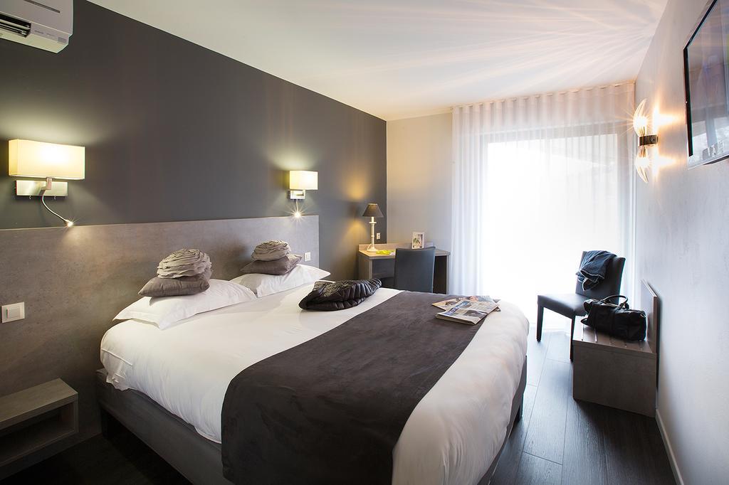 Chambre Quadruple (2 Adultes + 2 Enfants)