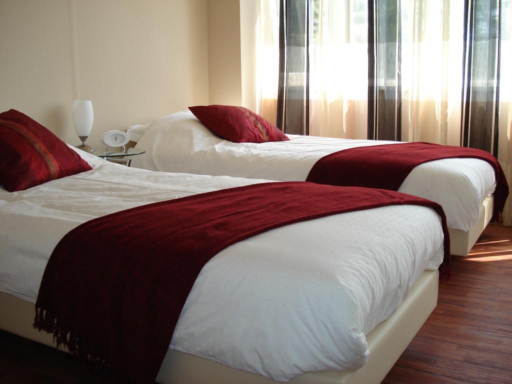Tweepersoonskamer met 2 Aparte Bedden