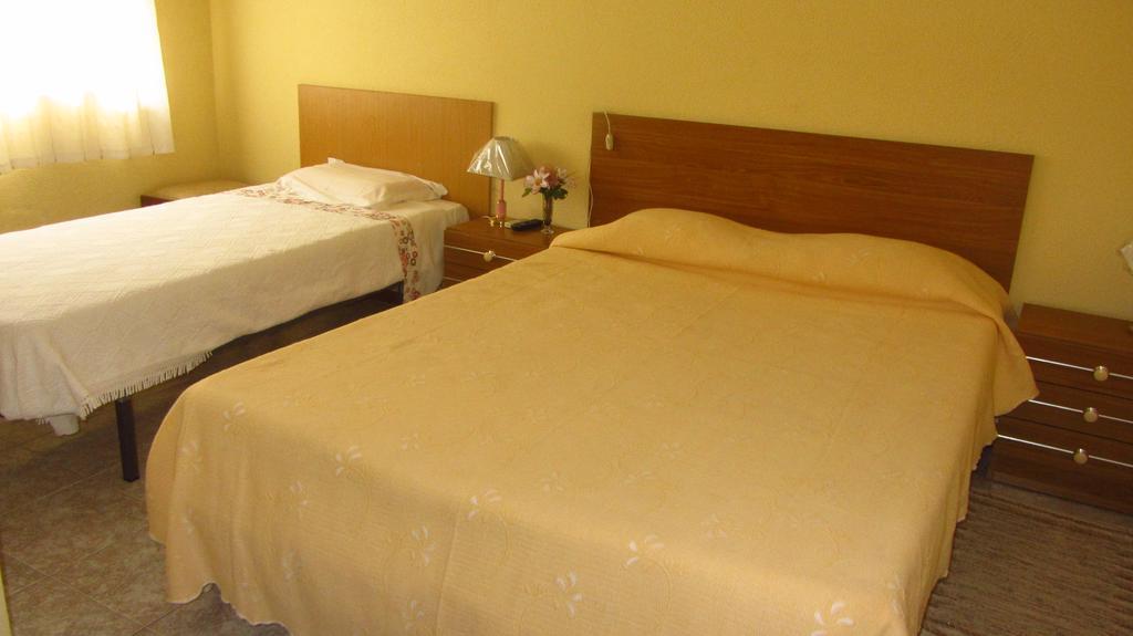 Quarto Duplo com Cama Extra