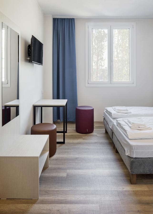 Kamer met twee aparte bedden voor eenpersoonsgebruik