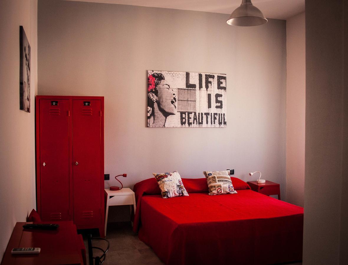 Camera Matrimoniale/Doppia con Letti Singoli con Letto Supplementare