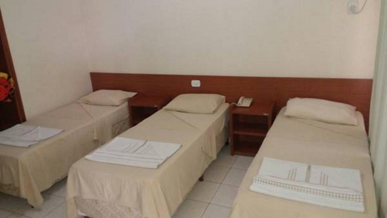 Quarto Triplo com Vista do Jardim