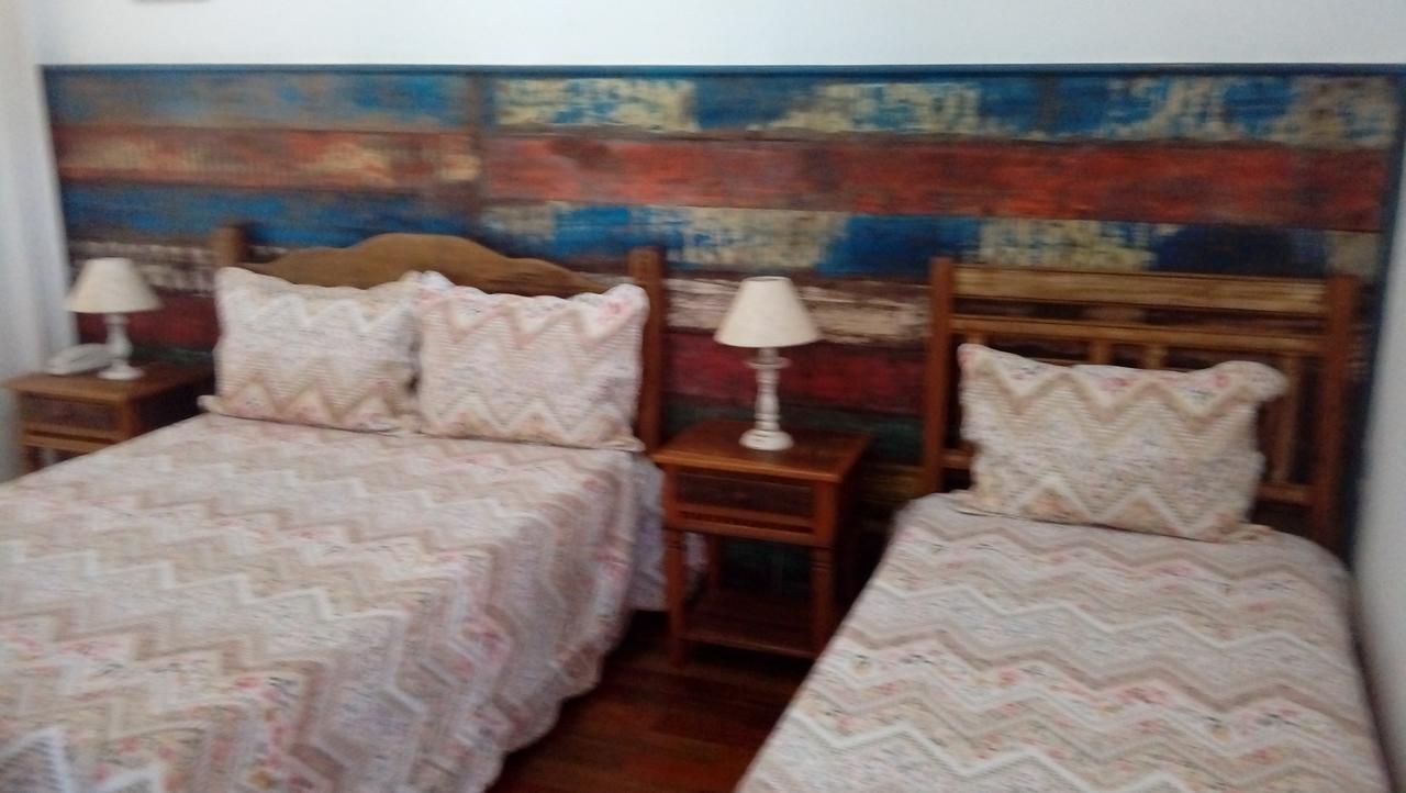 Quarto Triplo com Ar-condicionado