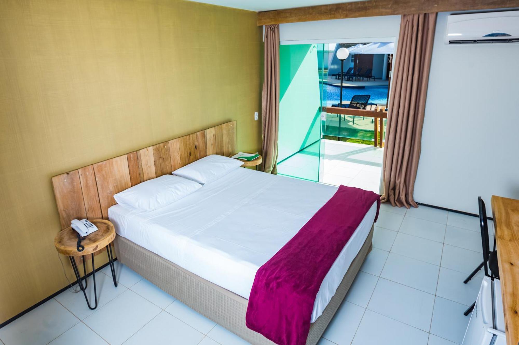Quarto Deluxe com Cama de Casal ou 2 de Solteiro